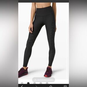 Size 8 Lululemon high rise, Mapped Out Tight , black graphite, grey camo pattern